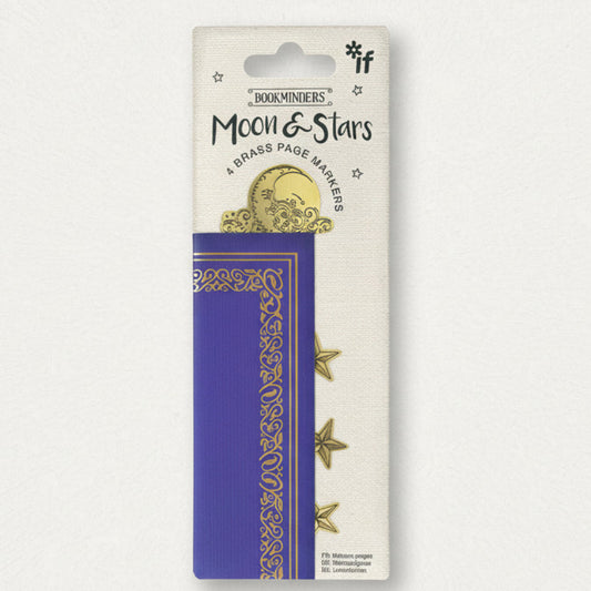 Moon & Stars brass page markers packaging with a purple book on a white background