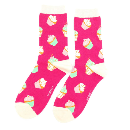 Pink socks with cupcake pattern on a white background
