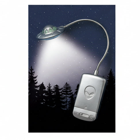 UFO-shaped lamp with alien design on a dark background