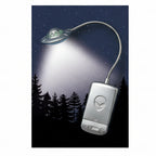 UFO-shaped lamp with alien design on a dark background