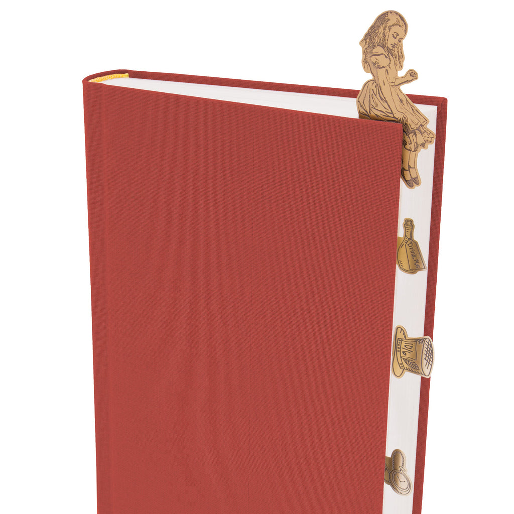 Red book with gold decorative elements on a white background