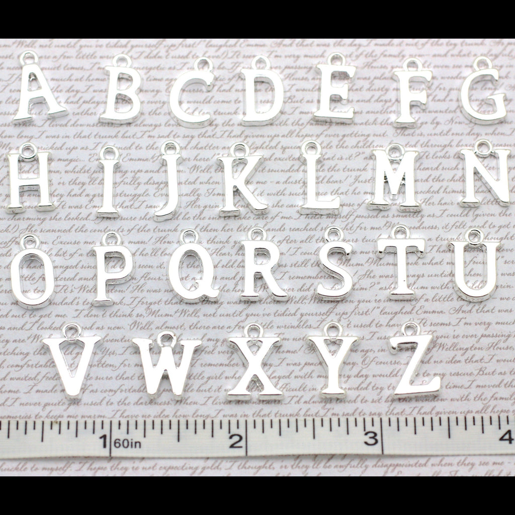 Alphabet letters from A to Z with a ruler at the bottom.
