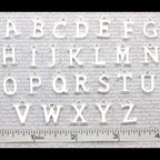 Alphabet letters from A to Z with a ruler at the bottom.