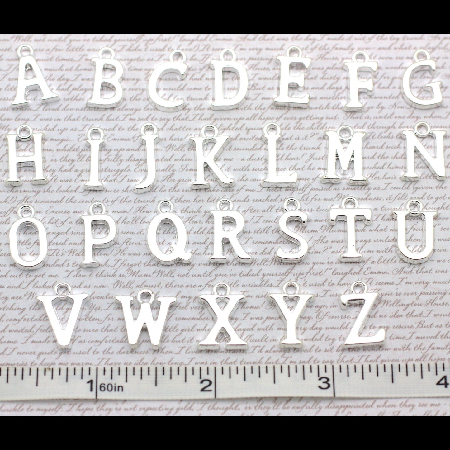 Alphabet letters from A to Z with a ruler at the bottom.