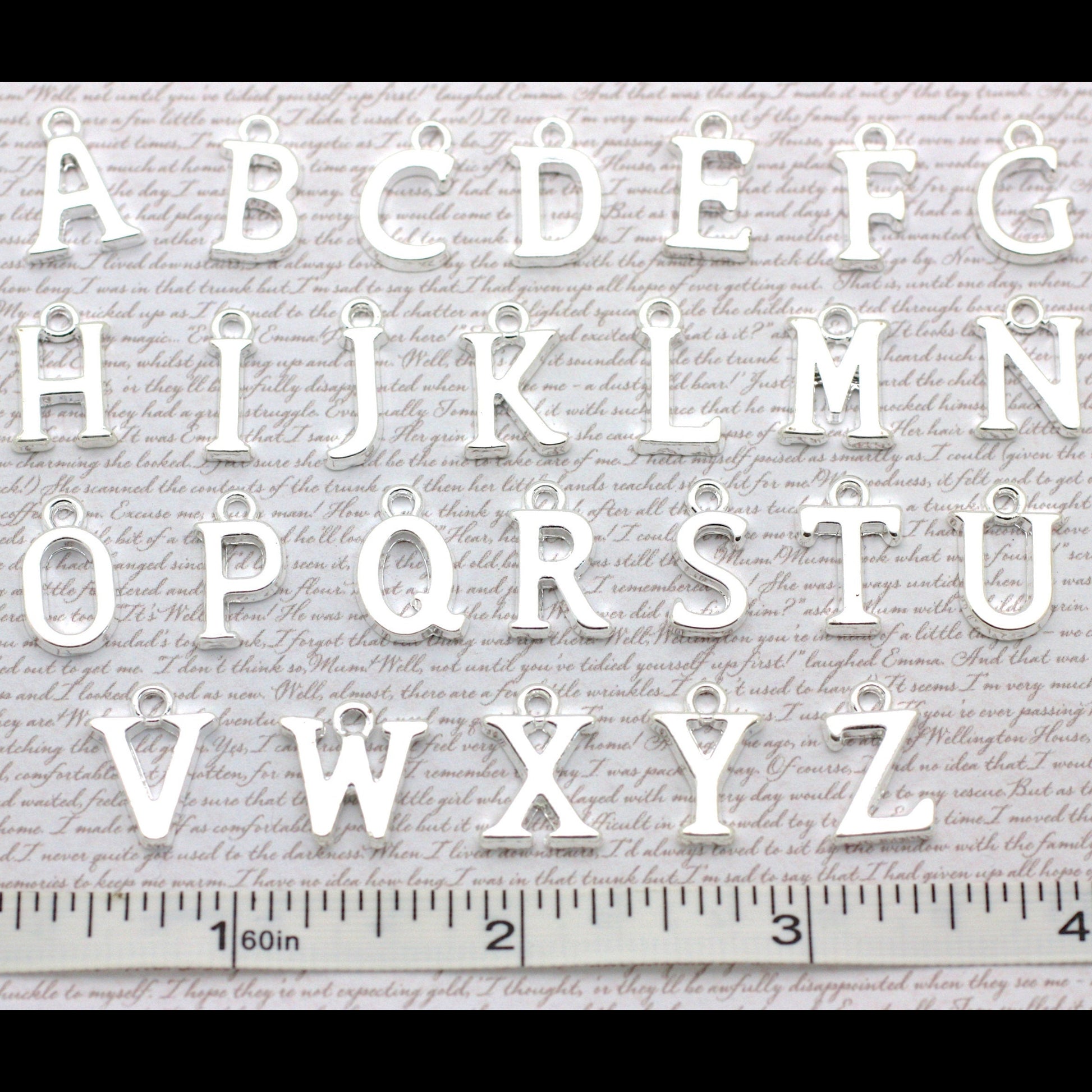 Alphabet letters from A to Z with a ruler at the bottom.