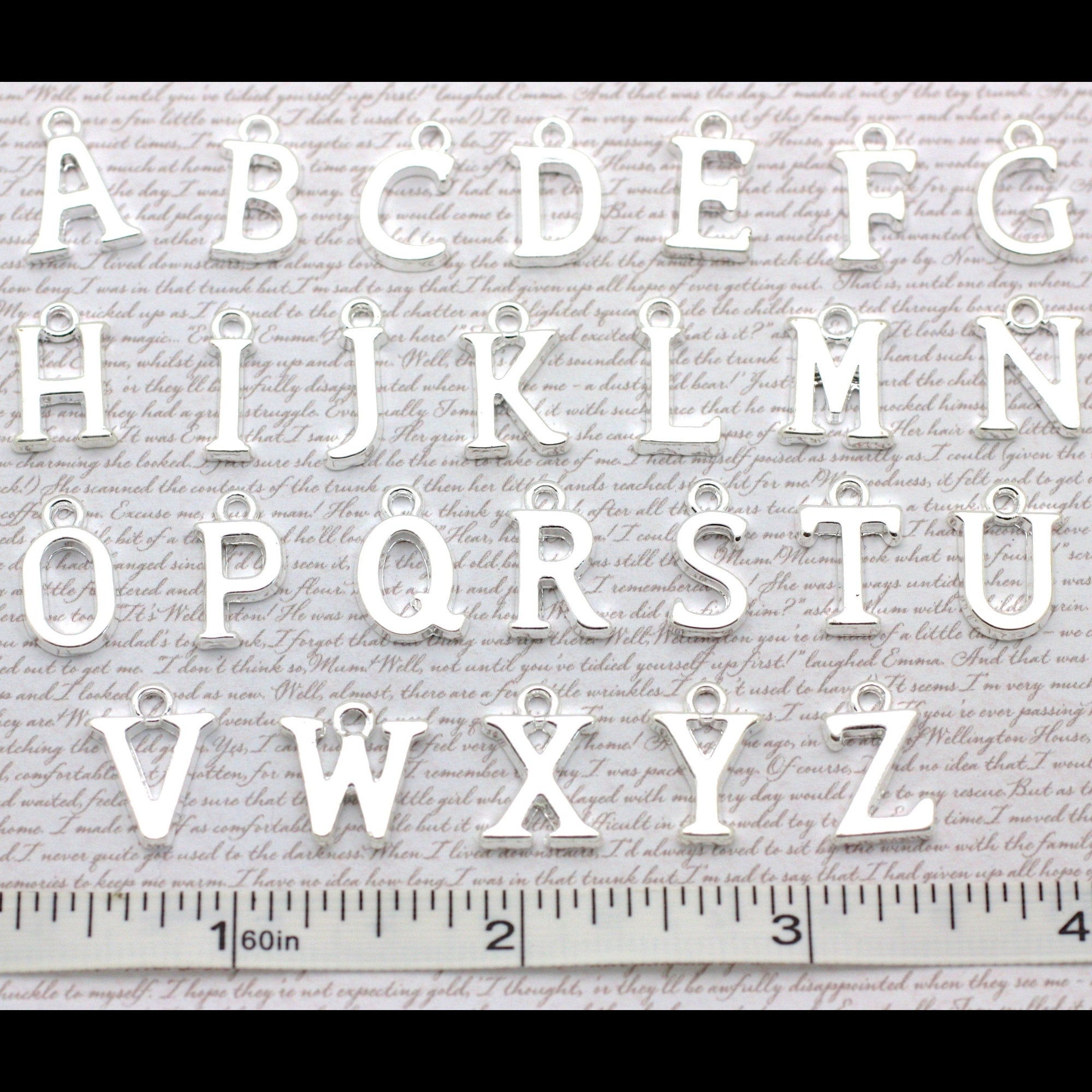 Alphabet letters from A to Z with a ruler at the bottom.