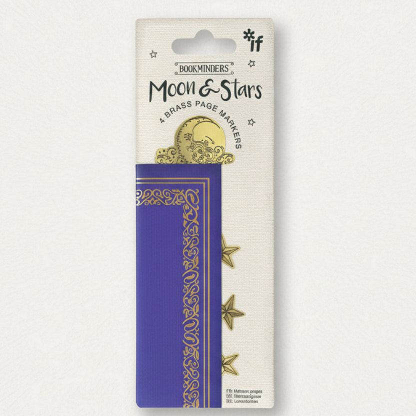 Moon & Stars brass page markers packaging with a purple book on a white background
