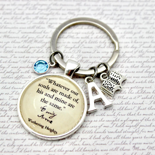 Keychain with a quote charm on a textured background