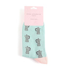 Mint green socks with coffee pot pattern on a white background