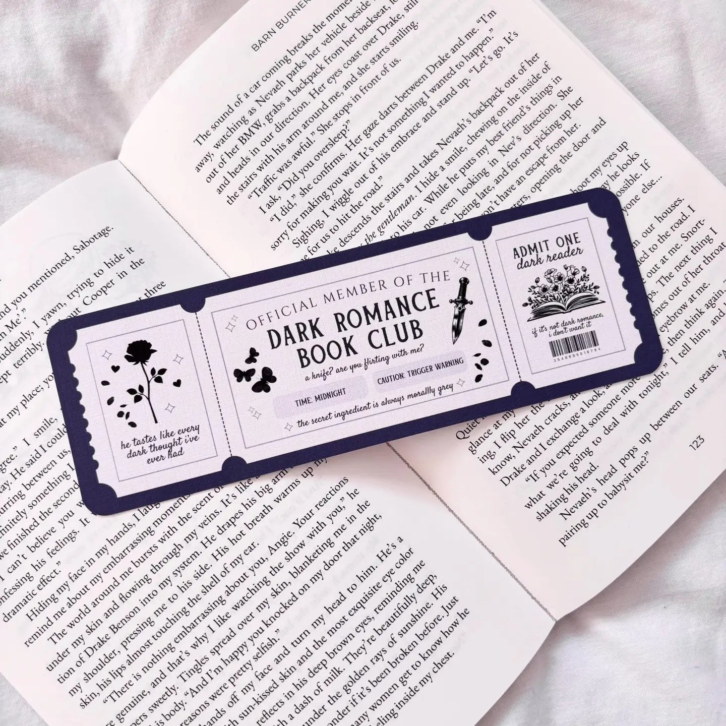 Bookmark with 'Dark Romance Book Club' design on an open book