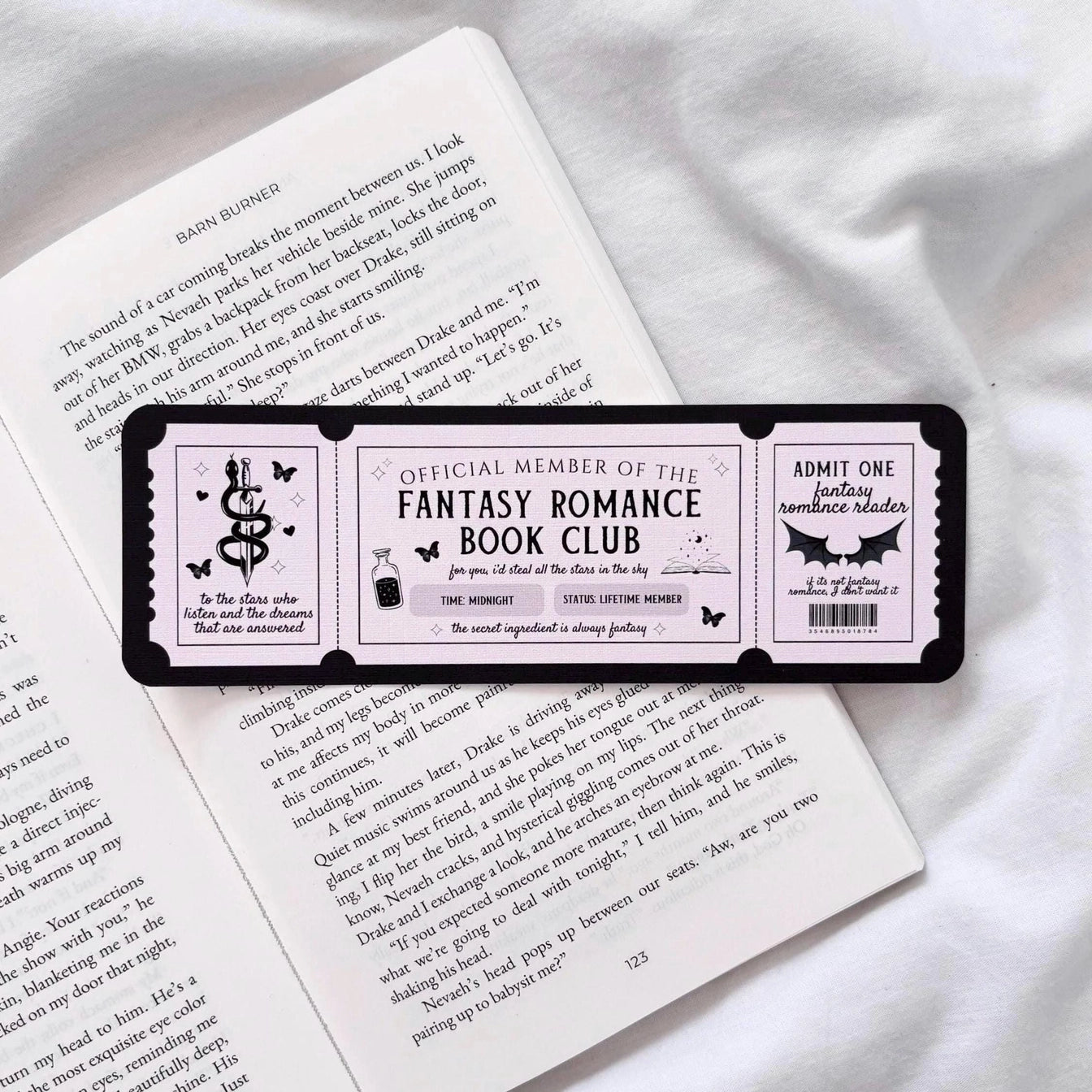 Fantasy romance book club membership card on a book background