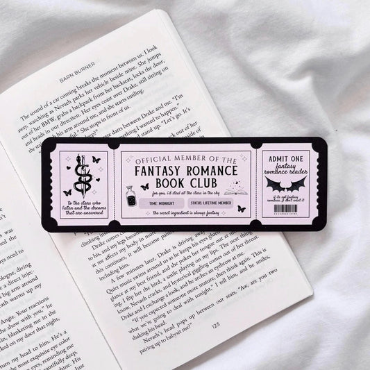 Fantasy romance book club membership card on a book background