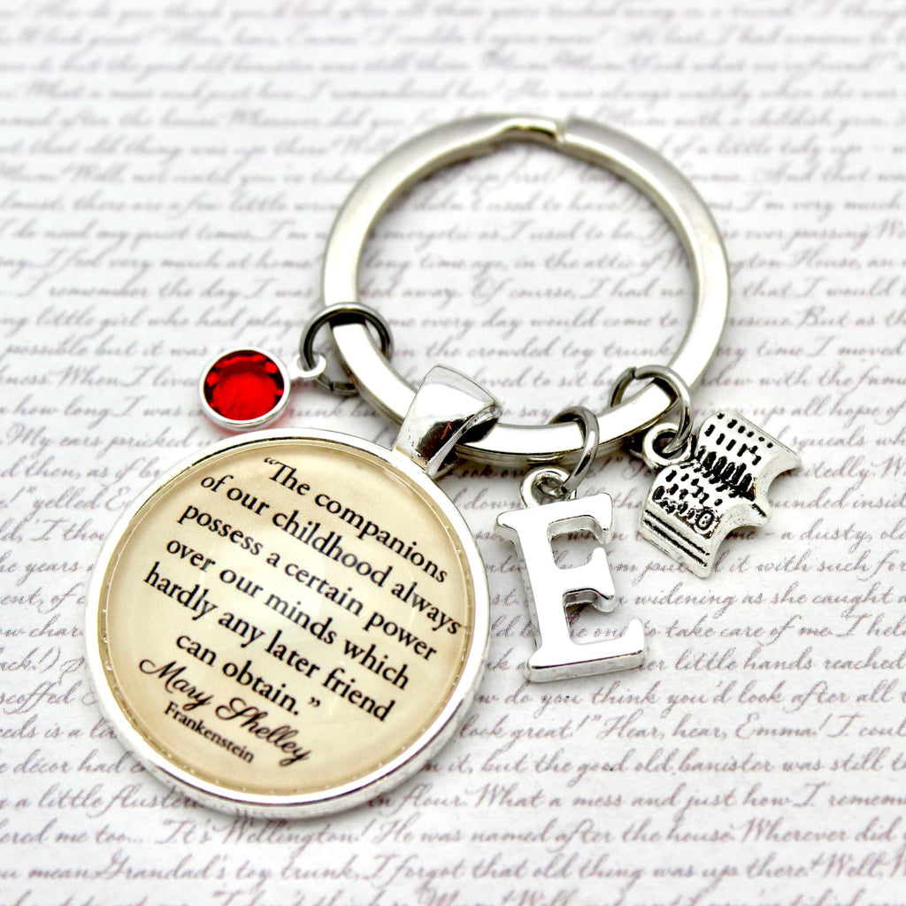 Keychain with Mary Shelley quote and charms 
