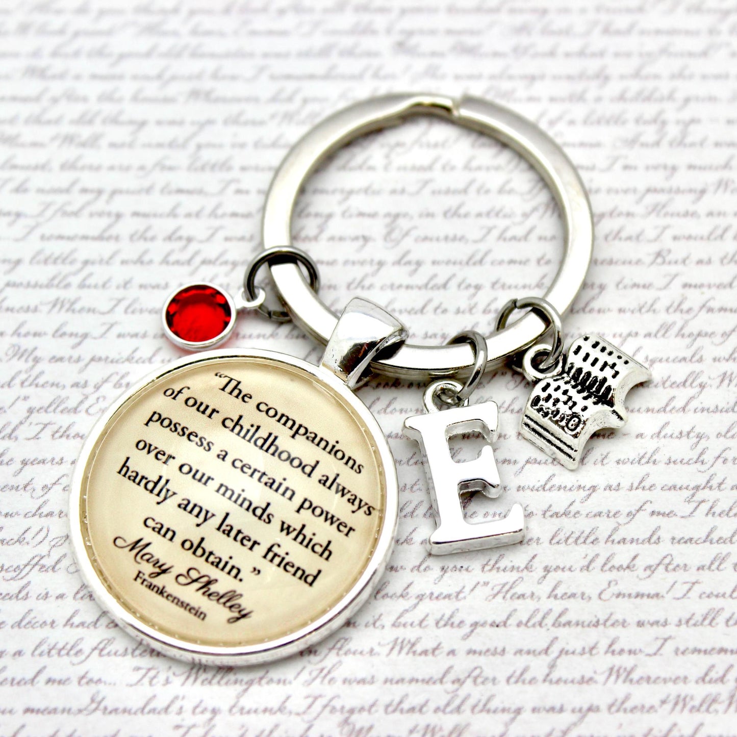 Keychain with Mary Shelley quote and charms 