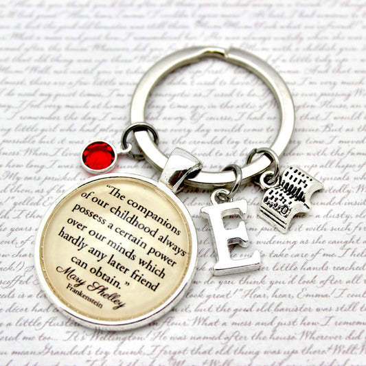 Keychain with Mary Shelley quote and charms 