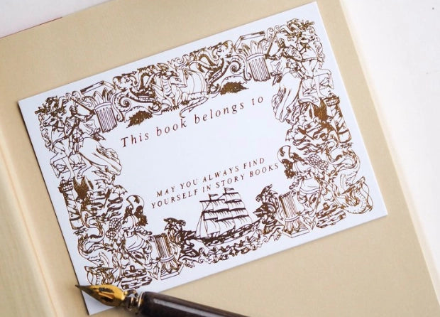 Decorative bookplate with ship illustration and text on a beige background