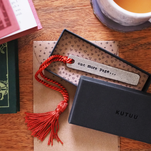 Pewter 'One more page' bookmark in packaging | Bookmark & Co
