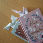 Paper bookmarks with ribbon in books | Bookmark & Co