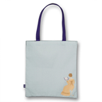 Pride & Prejudice tote bag with a design of a woman holding a book on a light blue background | Bookmark & Co