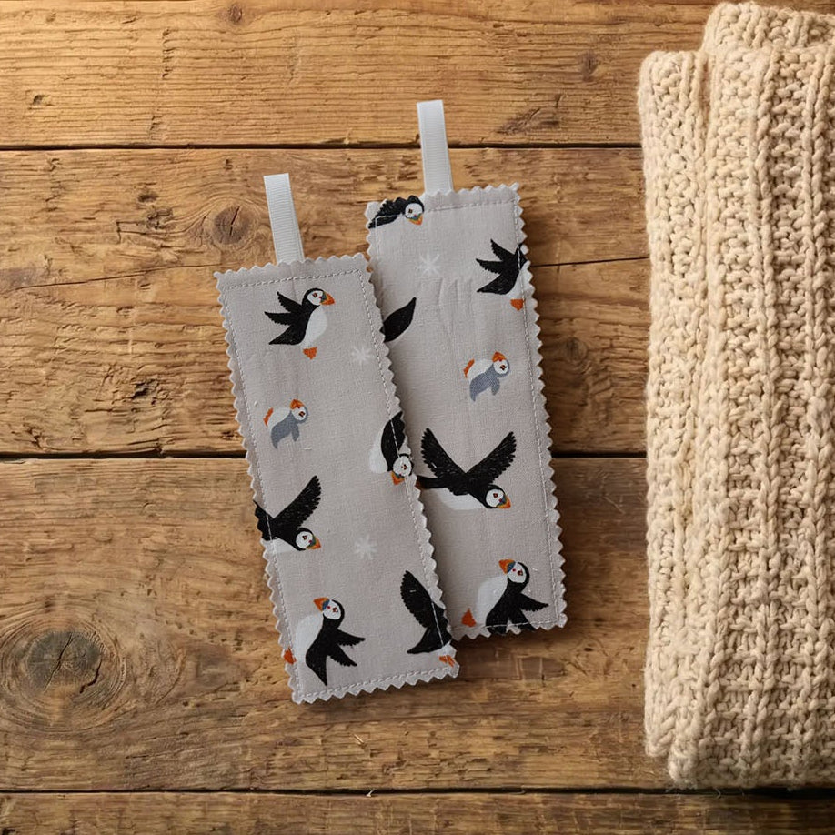 Puffin fabric bookmark on a wooden surface | Bookmark & Co