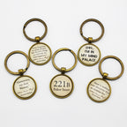 Set of keyrings with Sherlock Holmes quotes on a white background