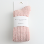 Pink sock on a hanger with 'Miss Sparrow London' label against a white background