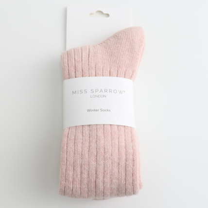 Pink sock on a hanger with 'Miss Sparrow London' label against a white background