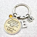 Keychain with a quote from L. Frank Baum 