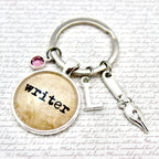 Keychain with 'writer' charm 