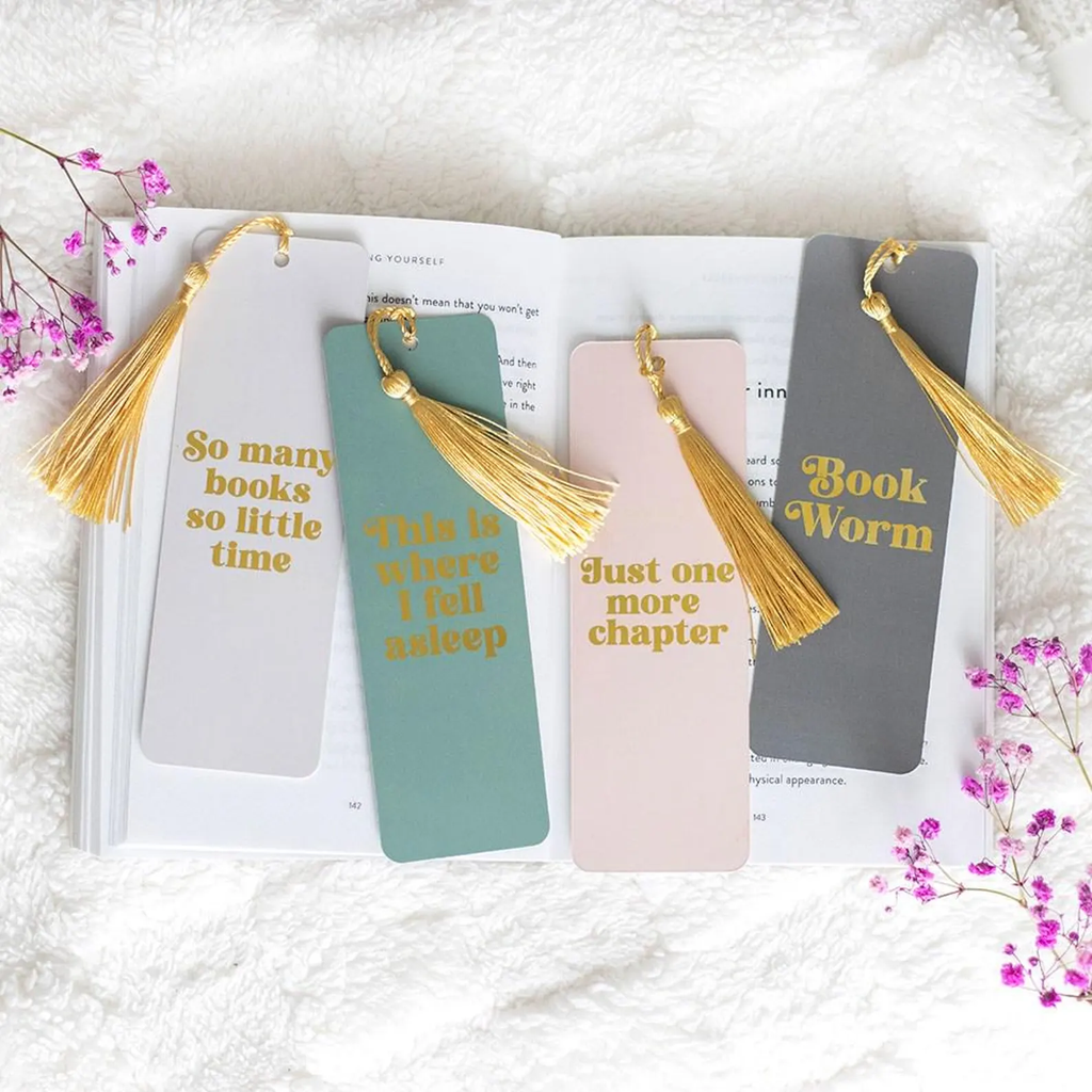 Selection of paper bookmarks each with gold tassel | Bookmark & Co