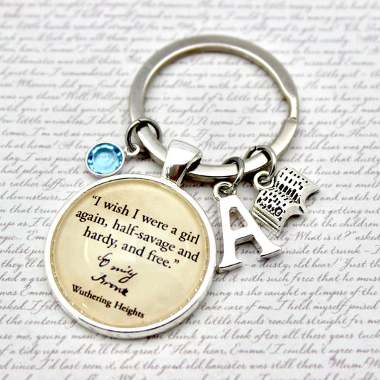 Keychain with quote and charms on a textured background