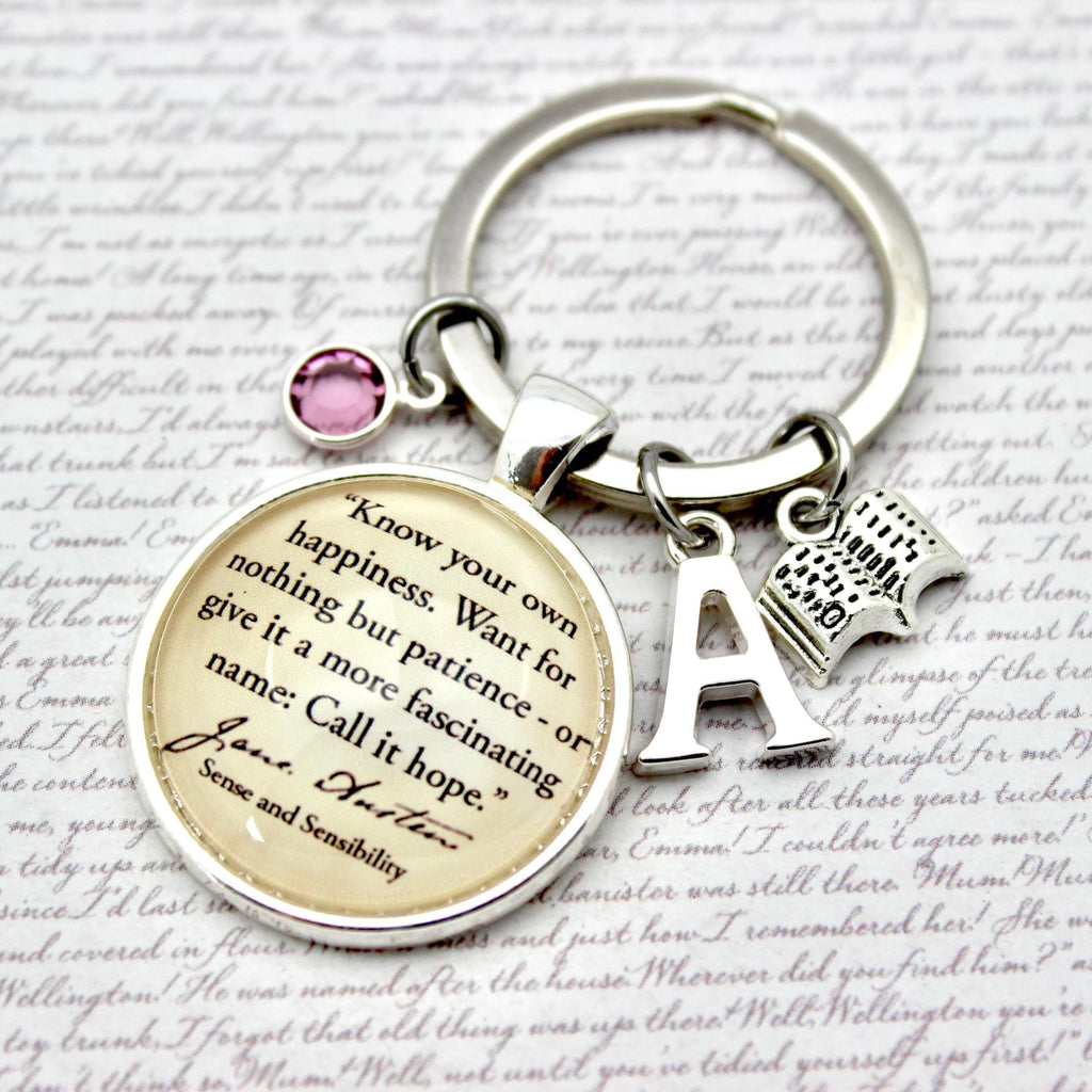 Keychain with circular charm featuring jane austen Know Your Own Happiness 