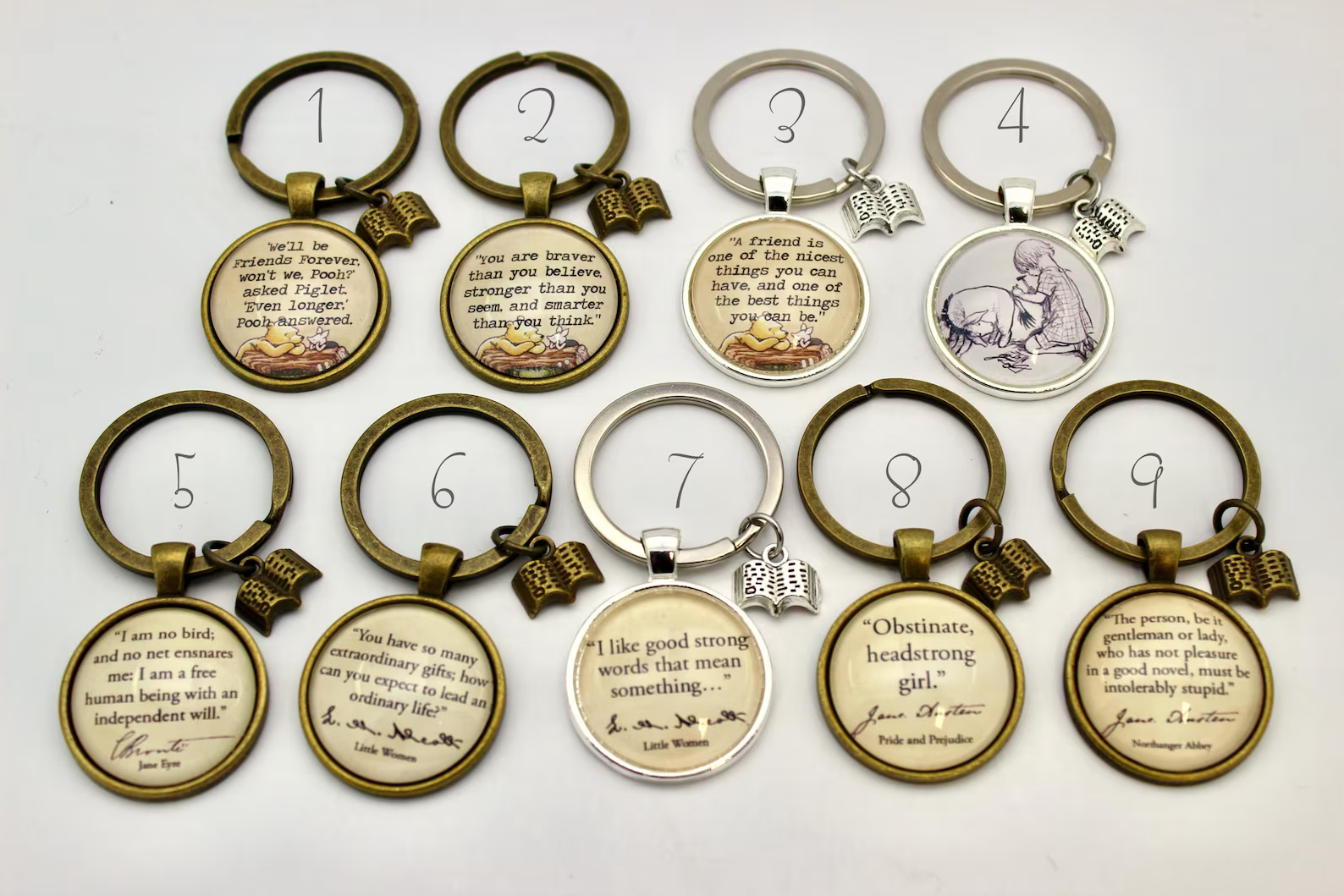 Selection of Literary Lane Boutique key rings with literary quotes on
