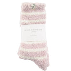 Pink and white fluffy socks with 'Miss Sparrow London' label on a white background