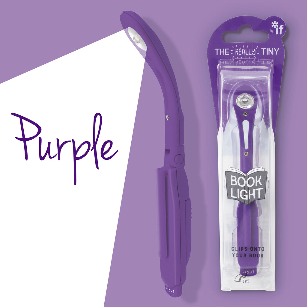 purple really tiny book light in package