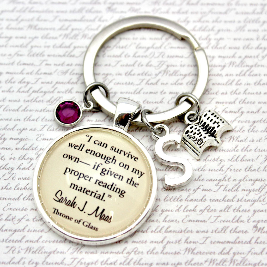 Keychain with a quote charm on a white background with text